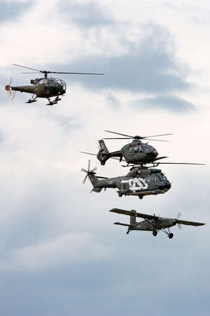Payerne, Switzerland - August 29, 2014: Formation of aircraft from the Swiss Air Force comprised of...