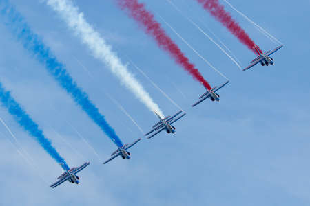 Payerne, Switzerland - August 30, 2014: Patrouille de France, the aerobatic display team of the French Air Force (Armee de lâAir) flying Dassault-Dornier Alpha Jet E jet trainer aircraft.のeditorial素材
