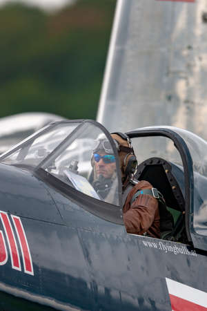 Payerne, Switzerland - August 31, 2014: Eric Goujon in the cockpit of Vought F4U-4 Corsair aircraft from the Flying Bulls Collection.のeditorial素材