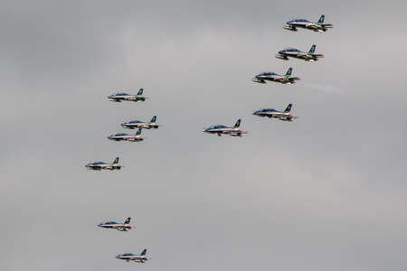 Payerne, Switzerland - September 4, 2014: Frecce Tricolori formation display team of the Italian Air Force (Aeronautica Militare Italiana) flying Aermacchi MB-339PAN aircraft.のeditorial素材