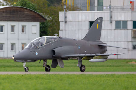 Payerne, Switzerland - August 31, 2014: Finnish Air Force British Aerospace Hawk Mk 51 jet trainer aircraft from the Midnight Hawks display team.のeditorial素材