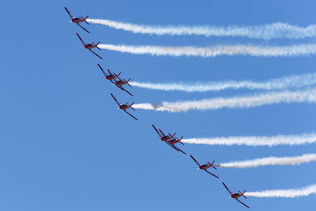 Payerne, Switzerland - August 31, 2014: Swiss Air Force PC-7 display team flying Pilatus PC-7 trainer aircraft.のeditorial素材