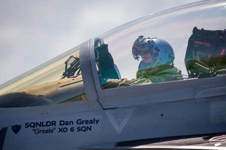 Avalon, Australia - March 1, 2015: Royal Australian Air Force (RAAF) Pilot in the cockpit of a Boeing F/A-18F Super Hornet multirole fighter aircraft in permeation for takeoff.のeditorial素材