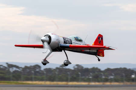 Avalon, Australia - February 27, 2015: Lithuanian aerobatic pilot Jurgis Kairys flying his Juka, an...