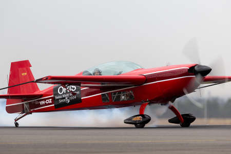 Avalon, Australia - February 28, 2015: Aerobatic pilot Melissa Pemberton (Melissa Andrzejewski) taxiing in Extra 300 aerobatic aircraft VH-CIZ.のeditorial素材
