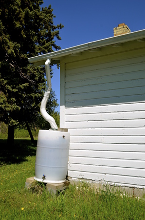A water catchment serves as a collection point of precipitation from a roof.の写真素材
