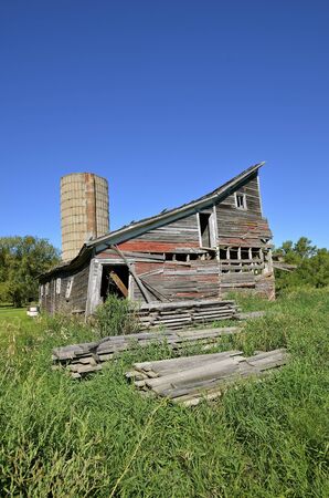Rickety abandoned falling apart old barnの写真素材