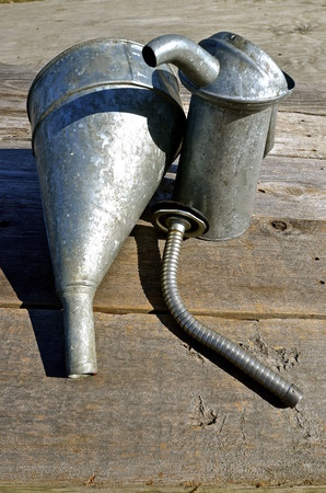Vintage galvanized funnets and oil can for lubrication,の写真素材