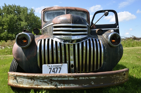 DOWNER, MINNESOTA, August 10, 2014: The old pickup from the 40's is a Chevrolet  colloquially referred to as Chevy and formally the Chevrolet Division of General Motors Company, is an American automobile division of the American manufacturer General Motorのeditorial素材