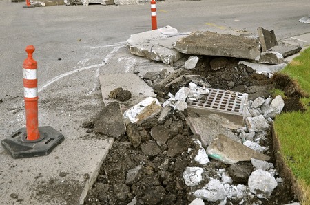 Curb repair project orange safety cones warning motoristsの写真素材