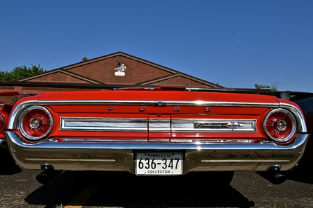 WEST FARGO, NORTH DAKOTA, July 20, 2017:  The West Fargo Cruise night occurs each 3rd Thursday night in the summer months and features classic cars such as this rear profile of a 1964 Galxy 500 Ford convertible.のeditorial素材