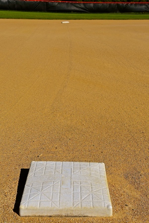 Second base is seen 90 feet down the line from third base on a baseball diamond