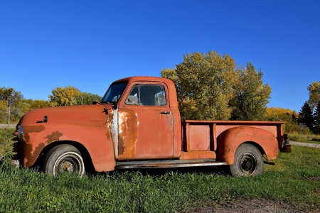 DOWNER, MINNESOTA, October 4, 2017: The old rusty 40's pickup colloquially referred to as Chevy and formally the Chevrolet Division of General Motors Company, is an American automobile division of the American manufacturerのeditorial素材