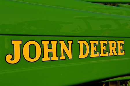 YANKTON, SOUTH DAKOTA, August 19, 2017: The new JOHN DEERE words identify machinery for the John Deere Co, an American corporation that manufactures agricultural, construction, forestry machinery, diesel engines, and drivetrains.のeditorial素材