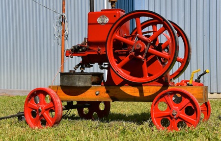 DALTON, MINNESOTA, Sept 8, 2017: A restored red portable International Harvester gas engine is...