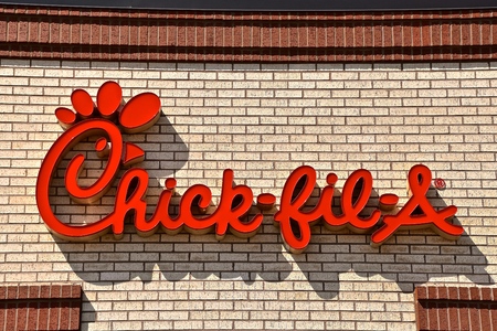ST. CLOUD, MINNESOTA, April 22, 2018: The Chick-fil-A sign and logo is an American fast food restaurant chain headquartered in the city of College Park, Georgia.のeditorial素材