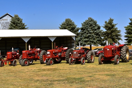 PEKIN, NORTH DAKOTA, September 2, 2018:  The old McCormick Deering and Farmall tractors are being displayed at the  Labor Day Stump Lake Village Threshing Bee.のeditorial素材