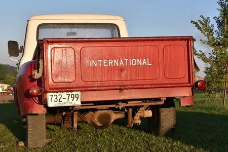 ROLLAG, MINNESOTA, September 1, 2018: The tailgate of an old International pickup shines in the sunlight at the annual WCSTR farm threshers reunion in Rollag held each labor Day weekend where thousands attend.のeditorial素材