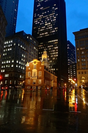 MASSACHUSETTS - December 23, 2013:  The Old State House building in Boston flanked by skyscrapers at nightのeditorial素材