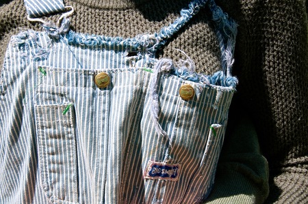 ROWLEY, MASSACHUSEETS, April 27, 2018: The worn out overall were a product of Big Smith of Carthage, Missouri, established in 1916, sold in 1971, now owned by Dickies.のeditorial素材