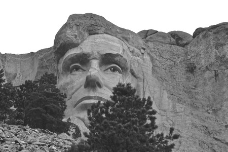 Mount Rushmore National Memorial near Keystone South Dakota, Looking up at a carved likeness of Abraham Lincoln at dusk. (black and white)のeditorial素材