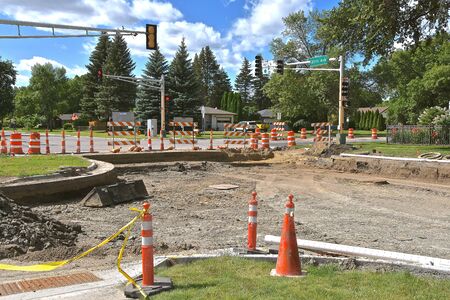 A street under construction is ready for layers of new roadbed and a final coat of asphalt.
