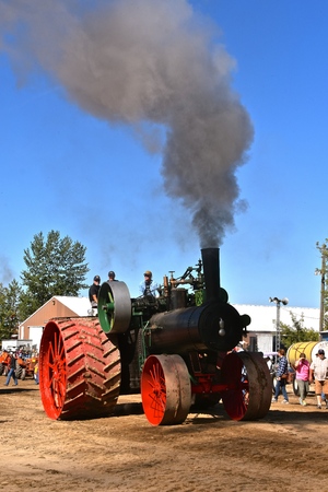 ROLLAG, MINNESOTA, August 30, 2019: The world's largest steam engine, the Case 150, participates in the parade at the annual WCSTR farm threshers reunion in Rollag held each labor Day weekend where thousands attend.のeditorial素材