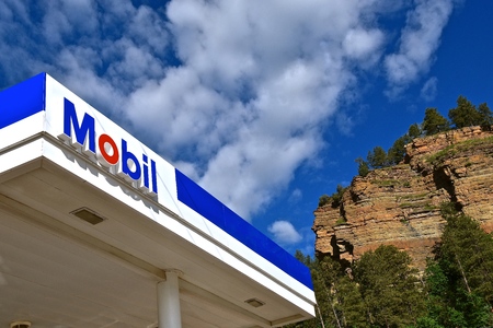 DEADWOOD, SOUTH DAKOTA, June 24, 2019:  The Mobil gas station sign was previously known as the Socony-Vacuum Oil Company, is a major American oil company that merged with Exxon in 1999 to form a parent company called ExxonMobil.のeditorial素材