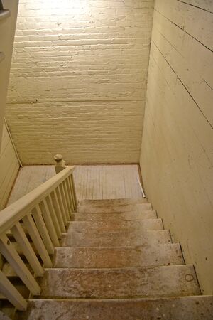 Old white painted worn-out steps leading to a higher levelの写真素材