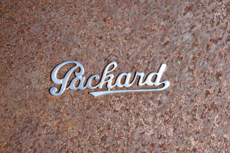 MARICOPA, ARIZONA, FEBRUARY 26, 2021:  The old Packard logo is from an American luxury automobile marque built by the Packard Motor Car Company of Detroit, Michigan, United States, establish in 1899.のeditorial素材
