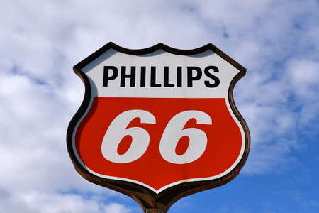 GREAT BEND, NORTH DAKOTA, may 9, 2021:  An old gas delivery truck bearing the logo represents Phillips 66 Company headquartered in Houston, Texas which is an American multinational energy company.のeditorial素材