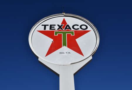 COLTON, SOUTH DAKOTA, May 10, 221: Founded in Beaumont, Texas, in 1902, the Texaco sign represents the now oil brand  merged into the Chevron Corporation and also had Havolin oil.のeditorial素材