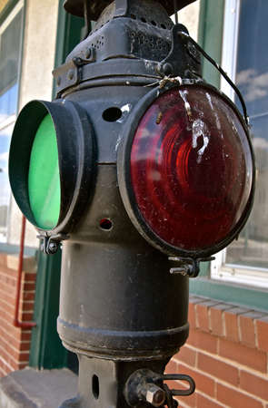 Antique old light signal with red and green lensused at a train depot stationの写真素材
