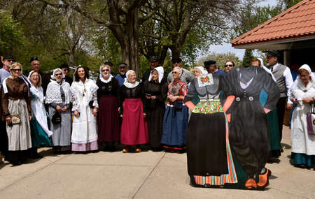 ORANGE CITY,  IOWA,  May 12, 2021: The Dutch Womens Choir sings in front of a photo op at the annual Orange City Tulip Festival held each May.のeditorial素材