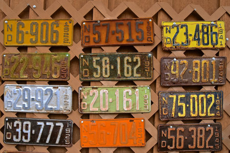 NECHE, NORTH DAKOTA, August 10, 2021: The collection of North Dakota license plates represents years of of distribution from the Department of Transportation.のeditorial素材