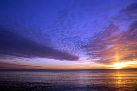 Beautiful winter sunrise over the atlantic ocean at Hampton Beach, NHの写真素材