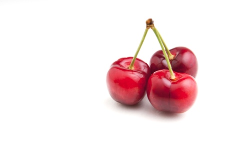 Freshly picked bunch of ripe red cherries
