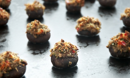Stuffed mushrooms fresh out of the oven on the stone