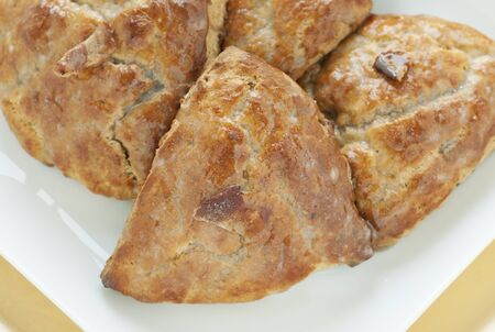White square plate of fresh scones の写真素材