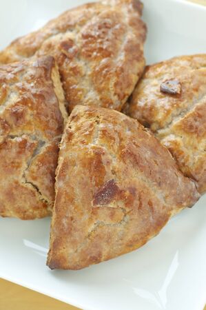White square plate of fresh sconesの写真素材