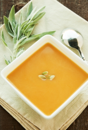 Warm bowl of fresh Fall squash soupの写真素材