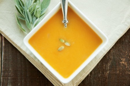 Warm bowl of fresh Fall squash soupの写真素材