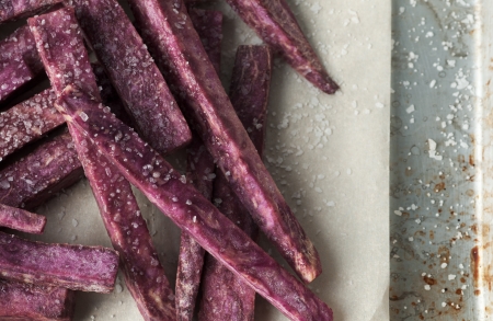 Gourmet purple sweet potato fries cut and prepped for cookingの写真素材