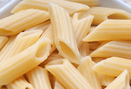 Freshly cooked al dente past tossed with olive oilの写真素材