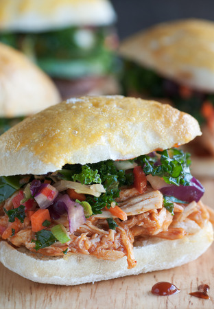 Mini appetizer sandwiches with pulled meat and vegetable slawの写真素材