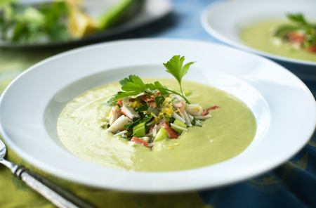 Creamy avocado soup with fresh crab saladの写真素材