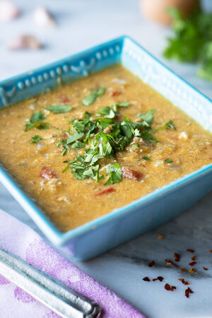 Asian inspired spicy pork and egg drop soupの写真素材