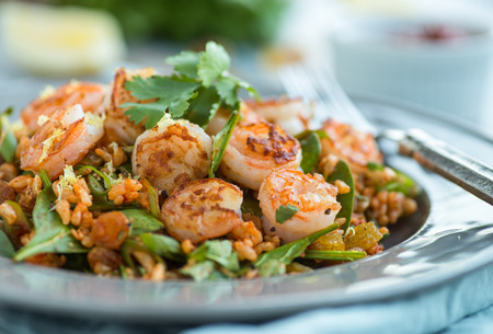 Spice shrimp and rice salad with spinachの写真素材