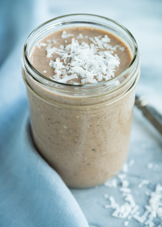 Coconut mocha smoothie for breakfast with fresh coconutの写真素材