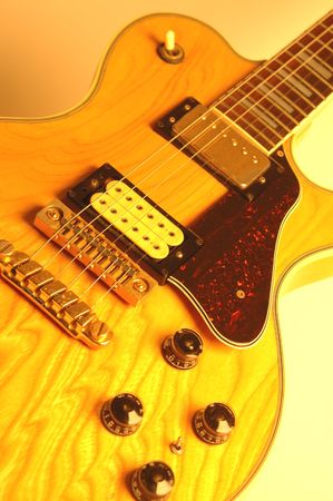 rock n' roll guitar with pick up in focus